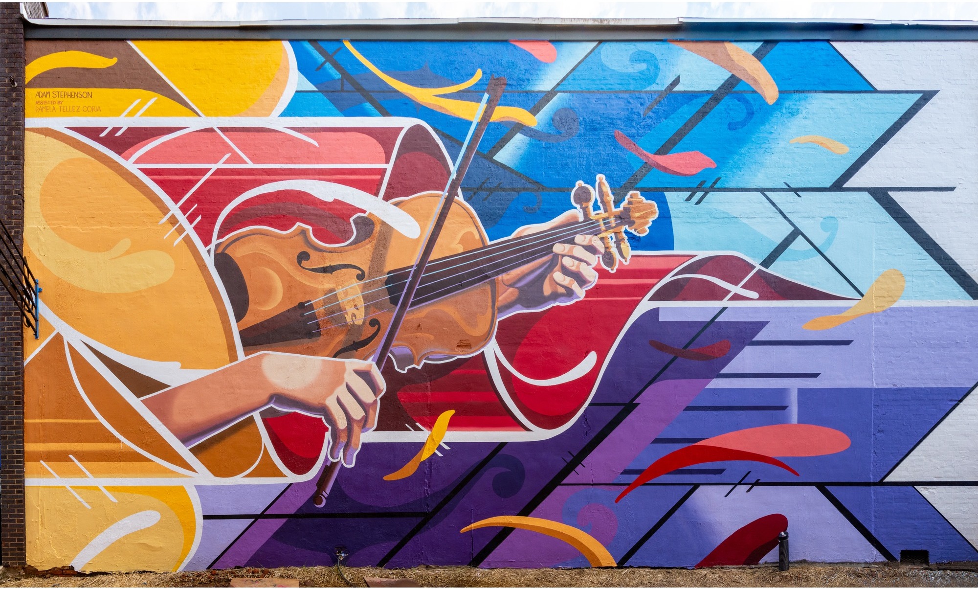 Playing the Sound of the Wind — 24×48 ft mural by Adam Stephenson in Athens, Alabama (2021)