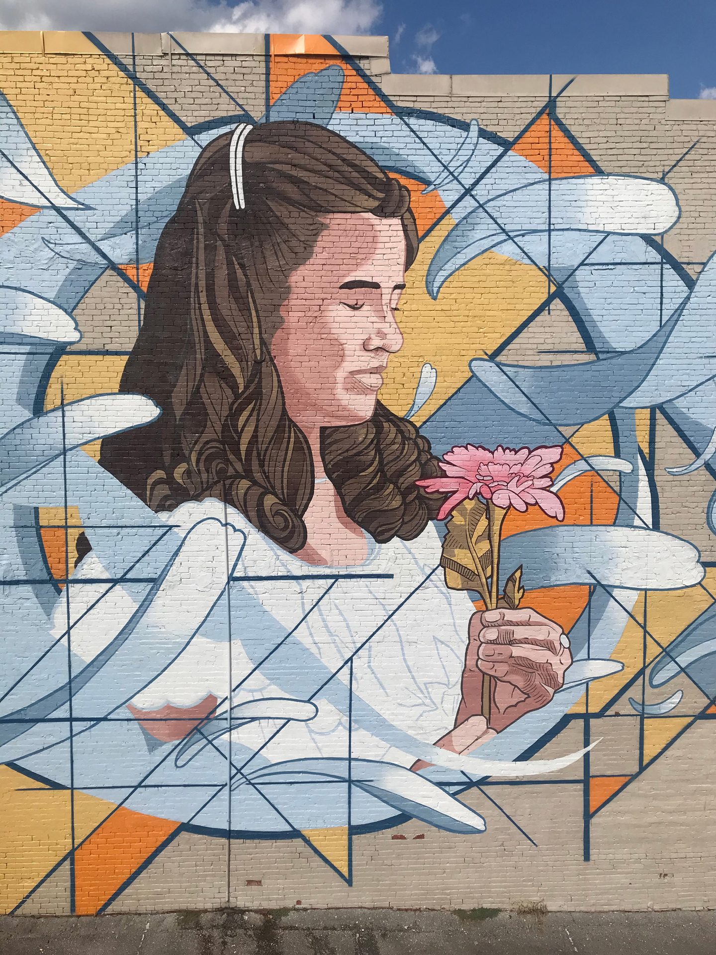Homecoming mural figure detail by Adam Stephenson, Downtown Decatur, Alabama, 2019