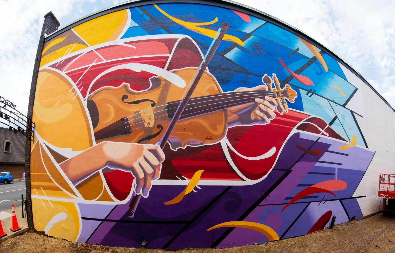 Playing the Sound of the Wind mural by Adam Stephenson, wide-angle view from Merchant's Alley, Athens, Alabama, 2021